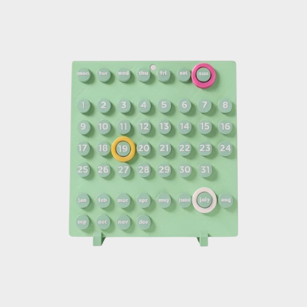 ZEMU DOTE pastel yeşil renkli, değiştirilebilir parçalara sahip minimalist kare masa takvimi.